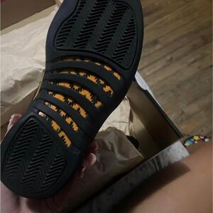 Jordan Air 12 Retro Black and Taxi